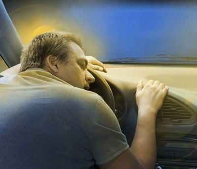 Man falling asleep while driving